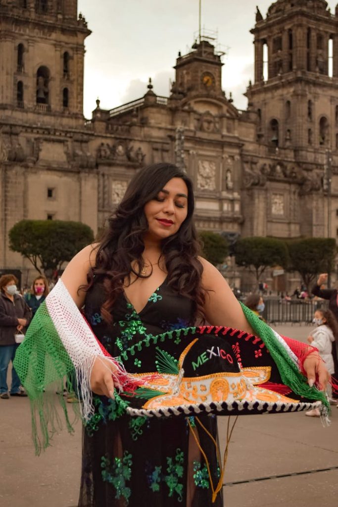 Woman in Traditional Clothing and with Sombrero